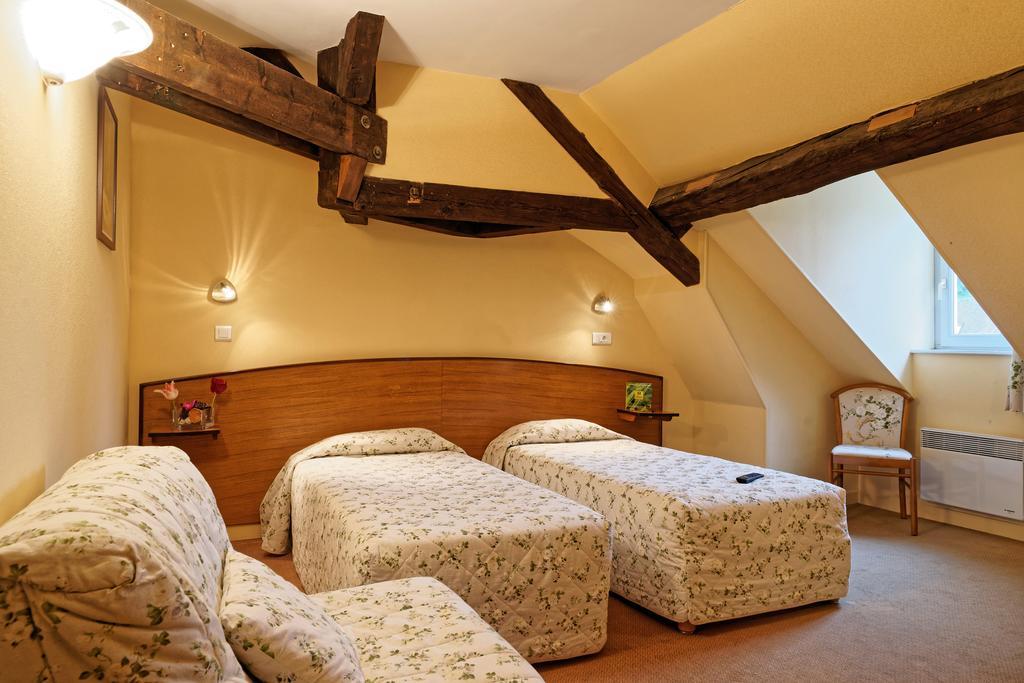 Hotel Logis Des Trois Maures Couches Exterior foto